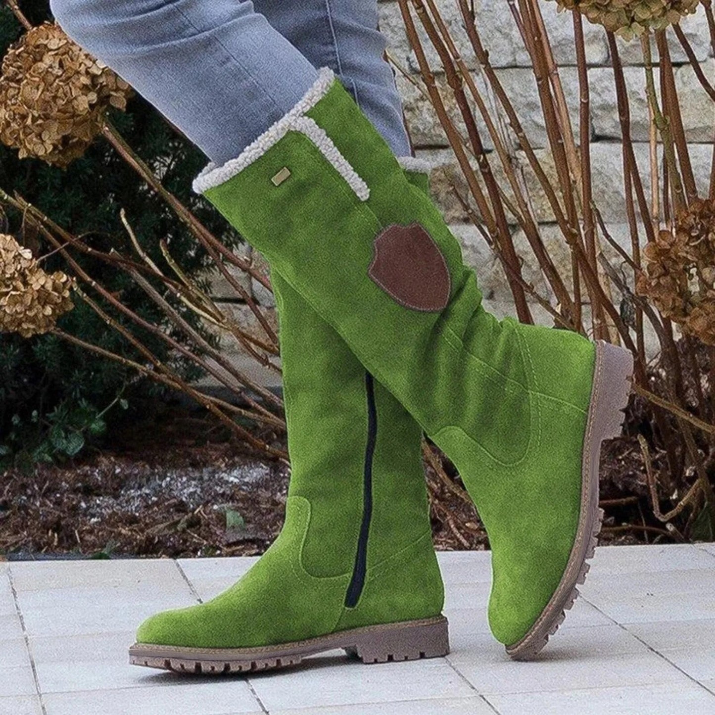 Bottes femme hauteur genou à bordure en peau lainée