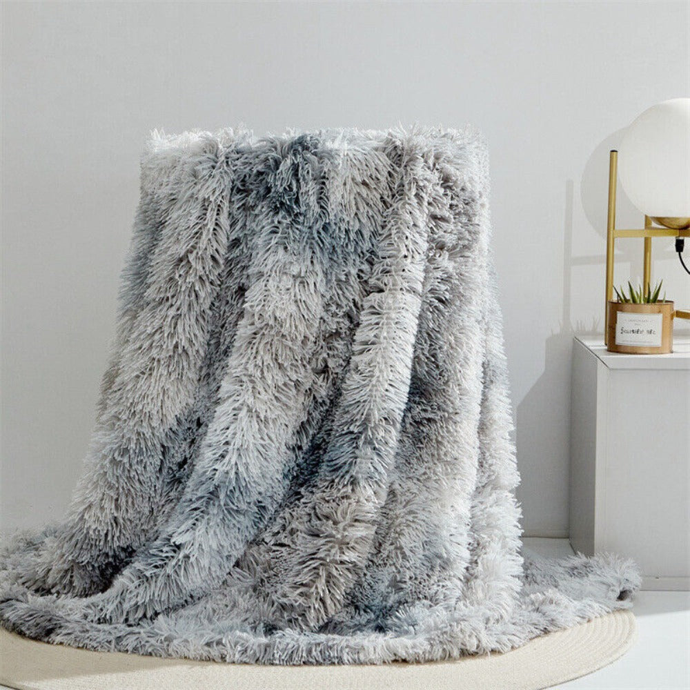 Plaid duveteux en fausse fourrure