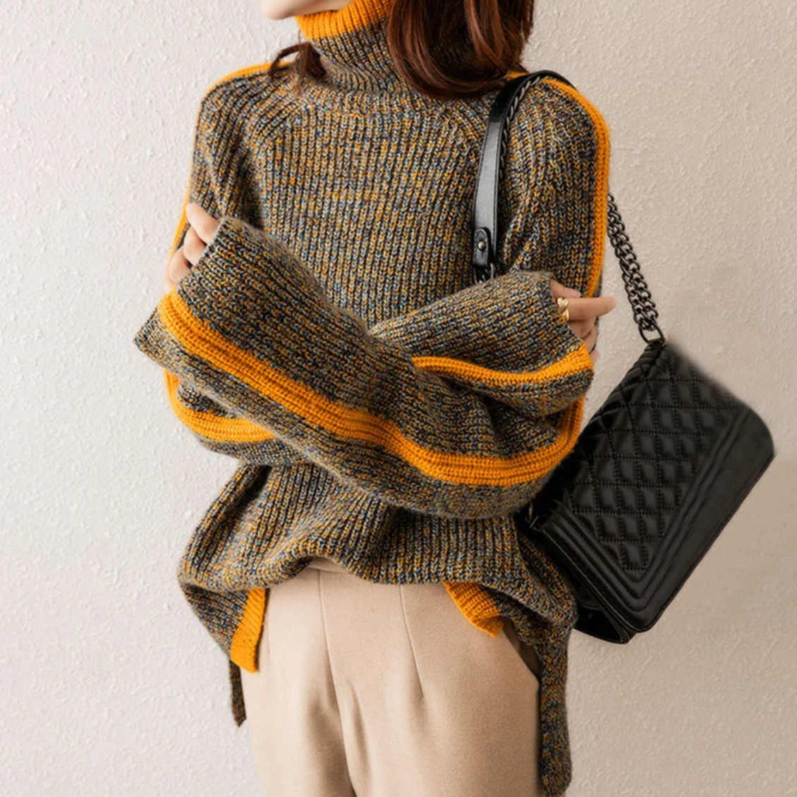 Pull femme à col roulé à manches rayées