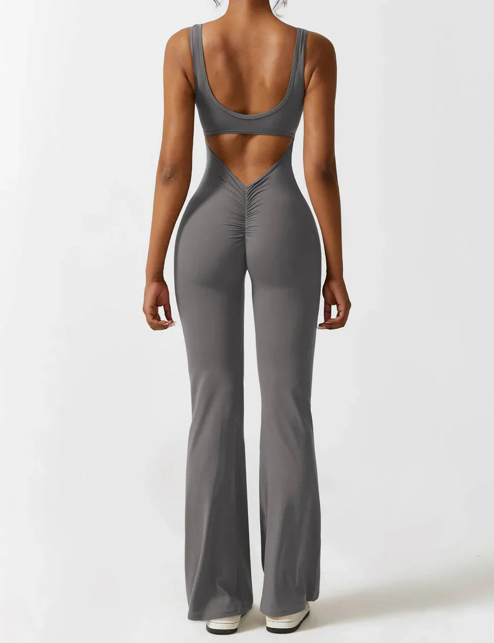 Combinaison de sport à dos ouvert pour femme