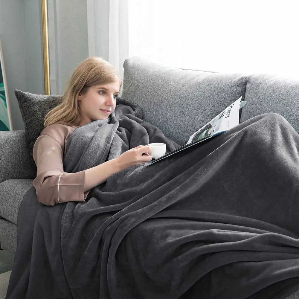 Couverture polaire douce – douillette pour les soirées fraîches – idéale pour une détente au chaud