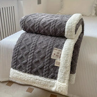 Couverture sherpa en maille à losanges