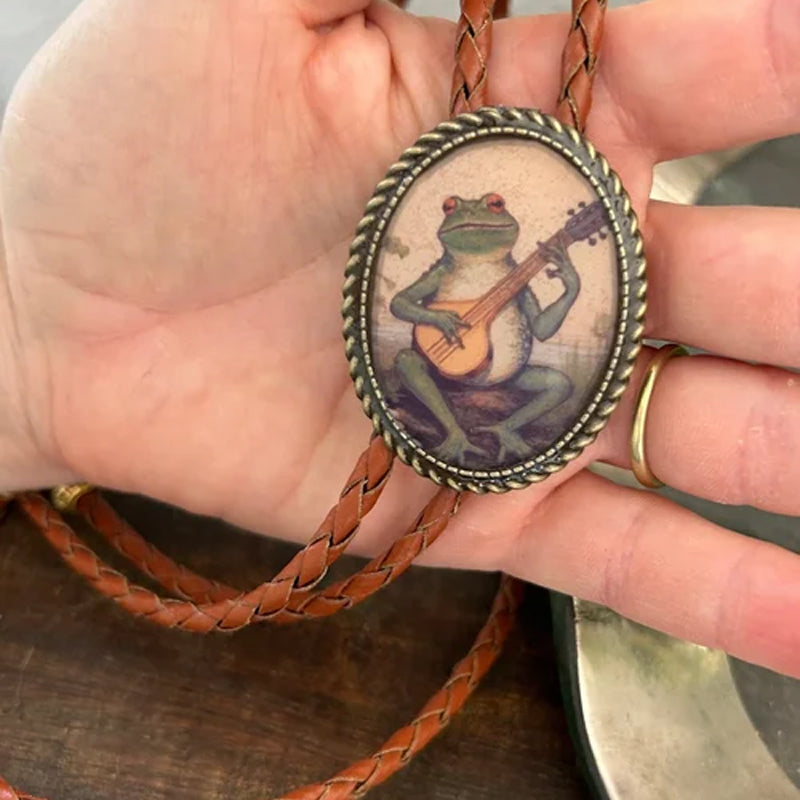 Cravate bolo motif grenouille au banjo