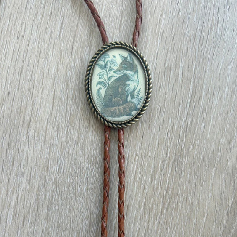 Cravate bolo motif grenouille au banjo