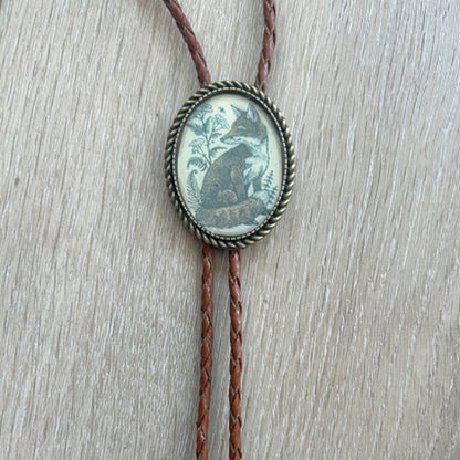 Cravate bolo motif grenouille au banjo