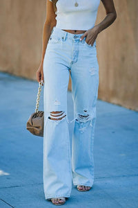 Jean femme à jambes larges effet destroy