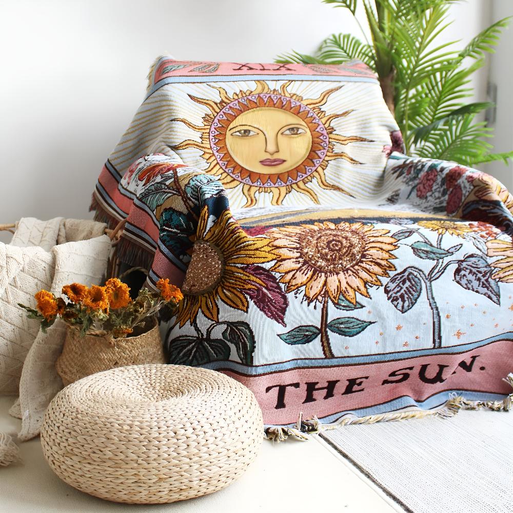 Plaid bohème façon tapisserie motif soleil