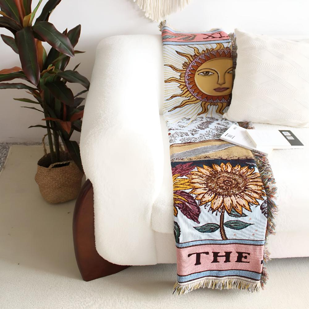 Plaid bohème façon tapisserie motif soleil