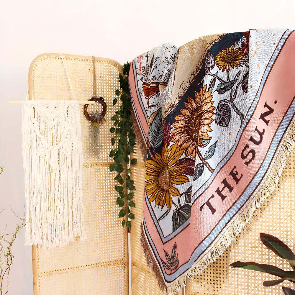 Plaid bohème façon tapisserie motif soleil