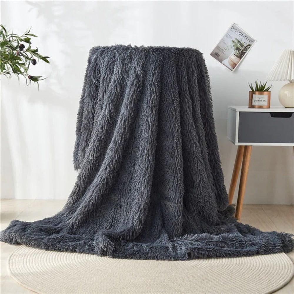 Plaid duveteux en fausse fourrure