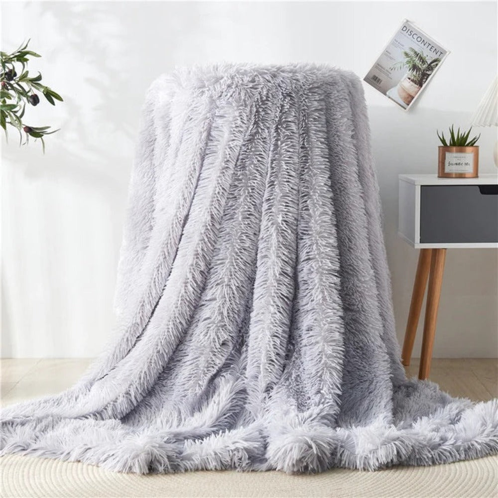 Plaid duveteux en fausse fourrure