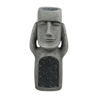 Pot de fleurs à visage sculpté