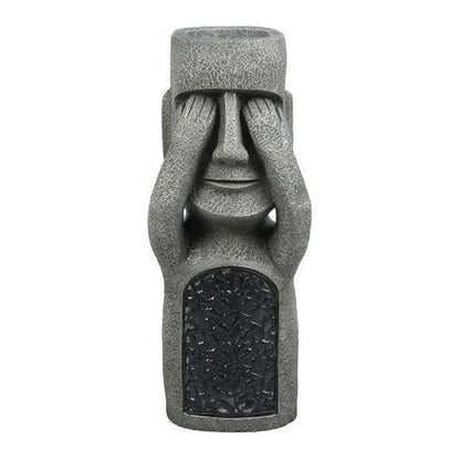 Pot de fleurs à visage sculpté