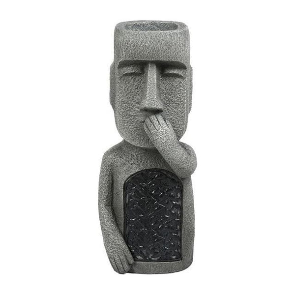 Pot de fleurs à visage sculpté