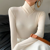Pull col roulé ajusté pour femme