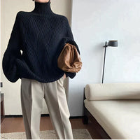 Pull col roulé noir