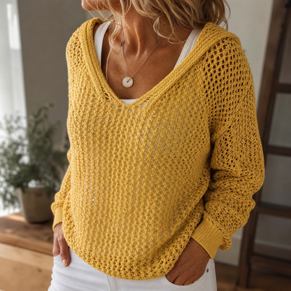 Pull femme à capuche en maille ajourée