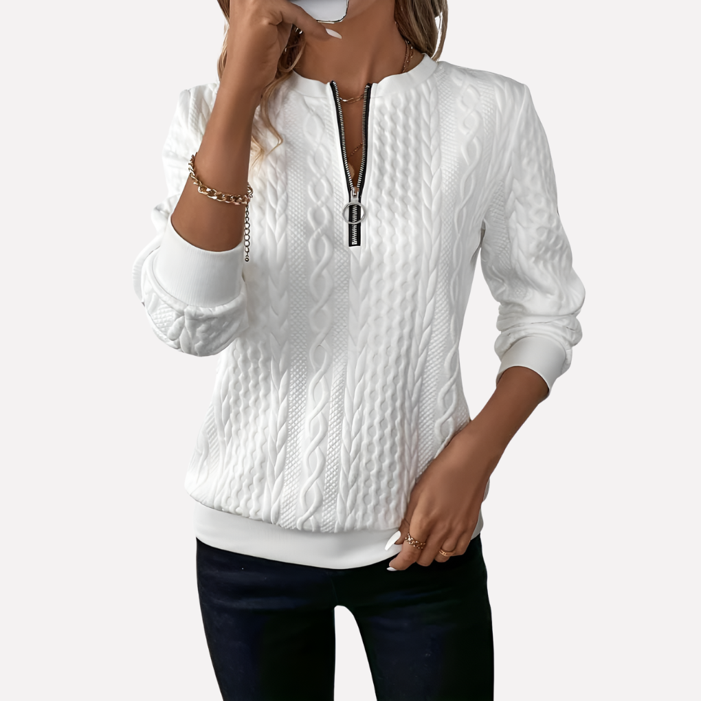 Pull femme en maille torsadée à col zippé