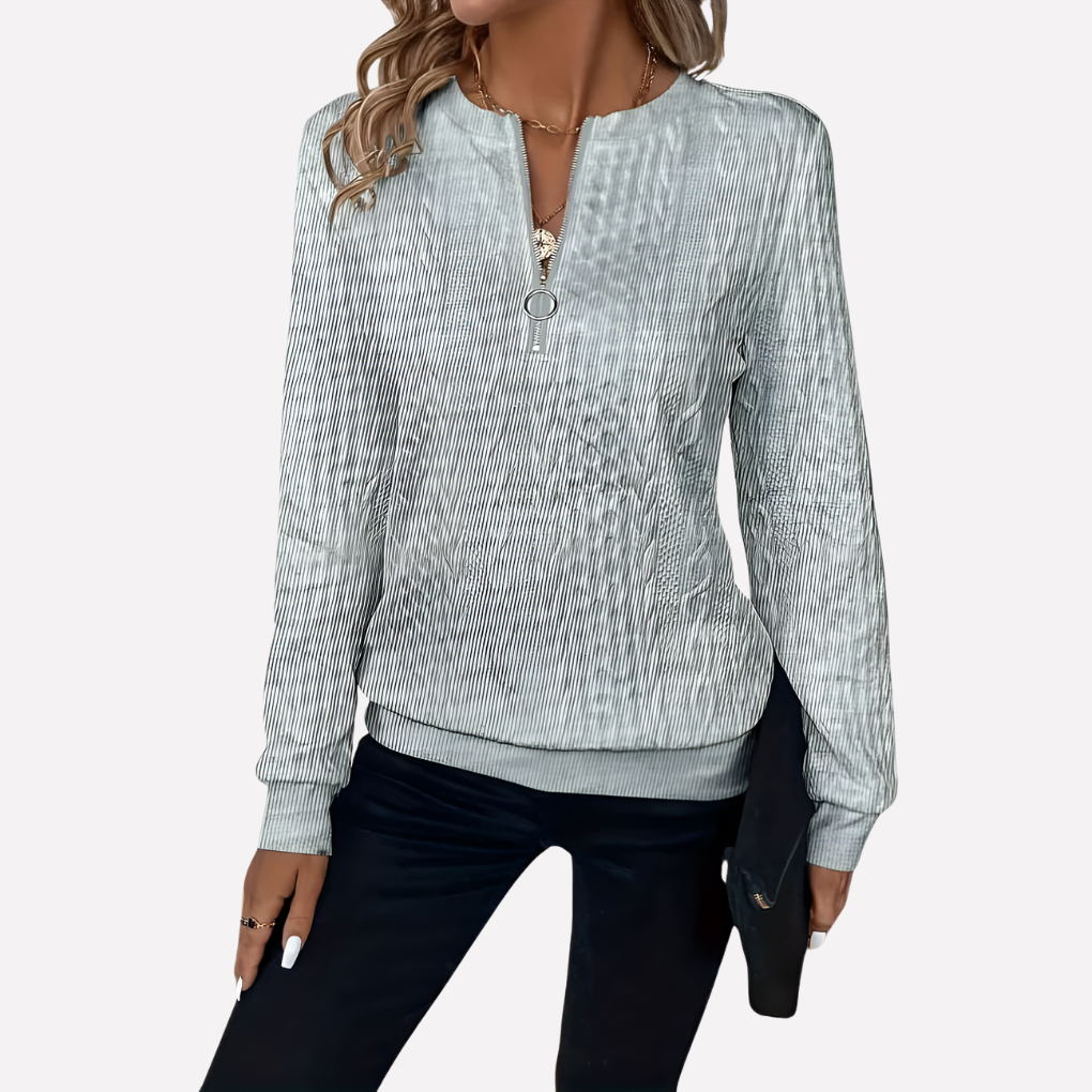 Pull femme en maille torsadée à col zippé