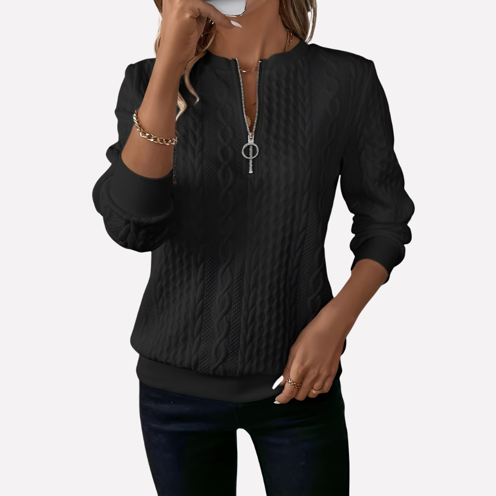 Pull femme en maille torsadée à col zippé