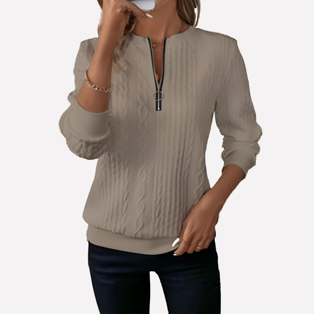 Pull femme en maille torsadée à col zippé