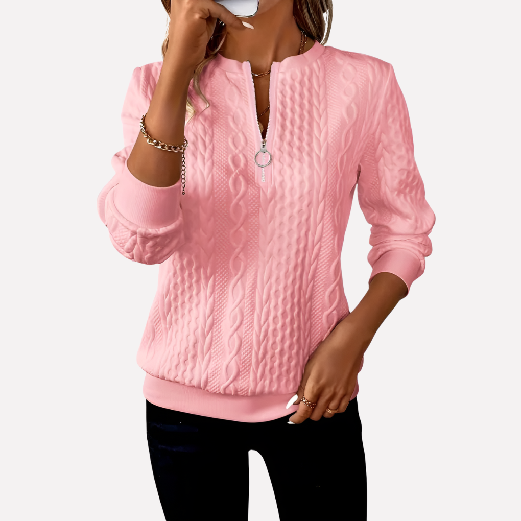 Pull femme en maille torsadée à col zippé