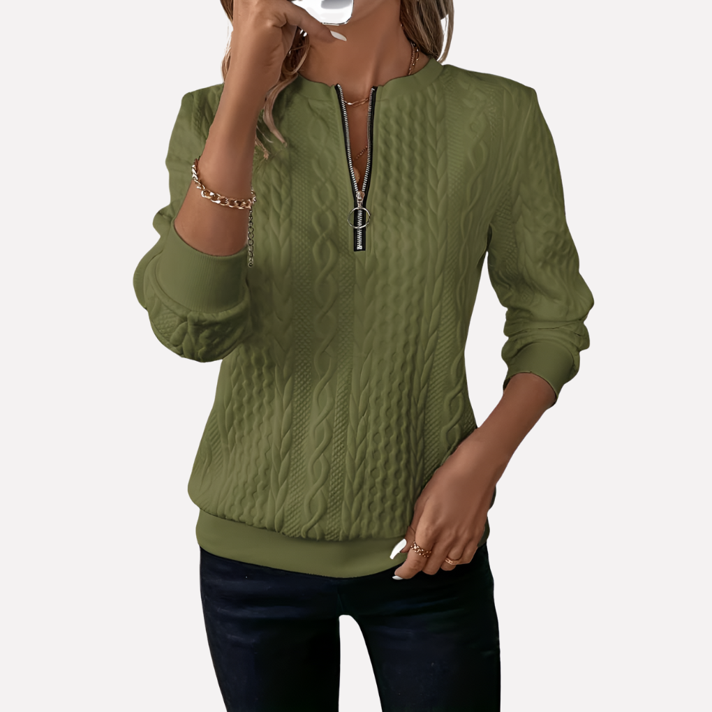 Pull femme en maille torsadée à col zippé