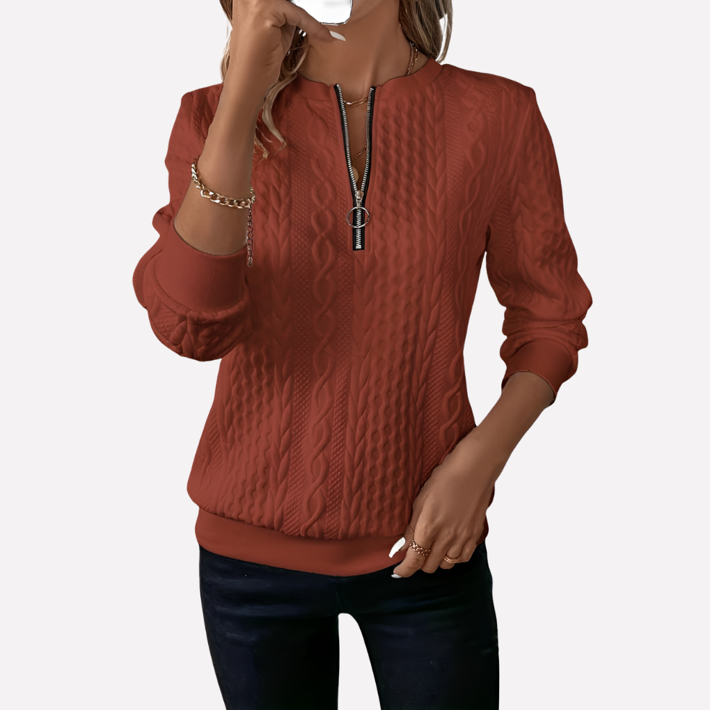 Pull femme en maille torsadée à col zippé