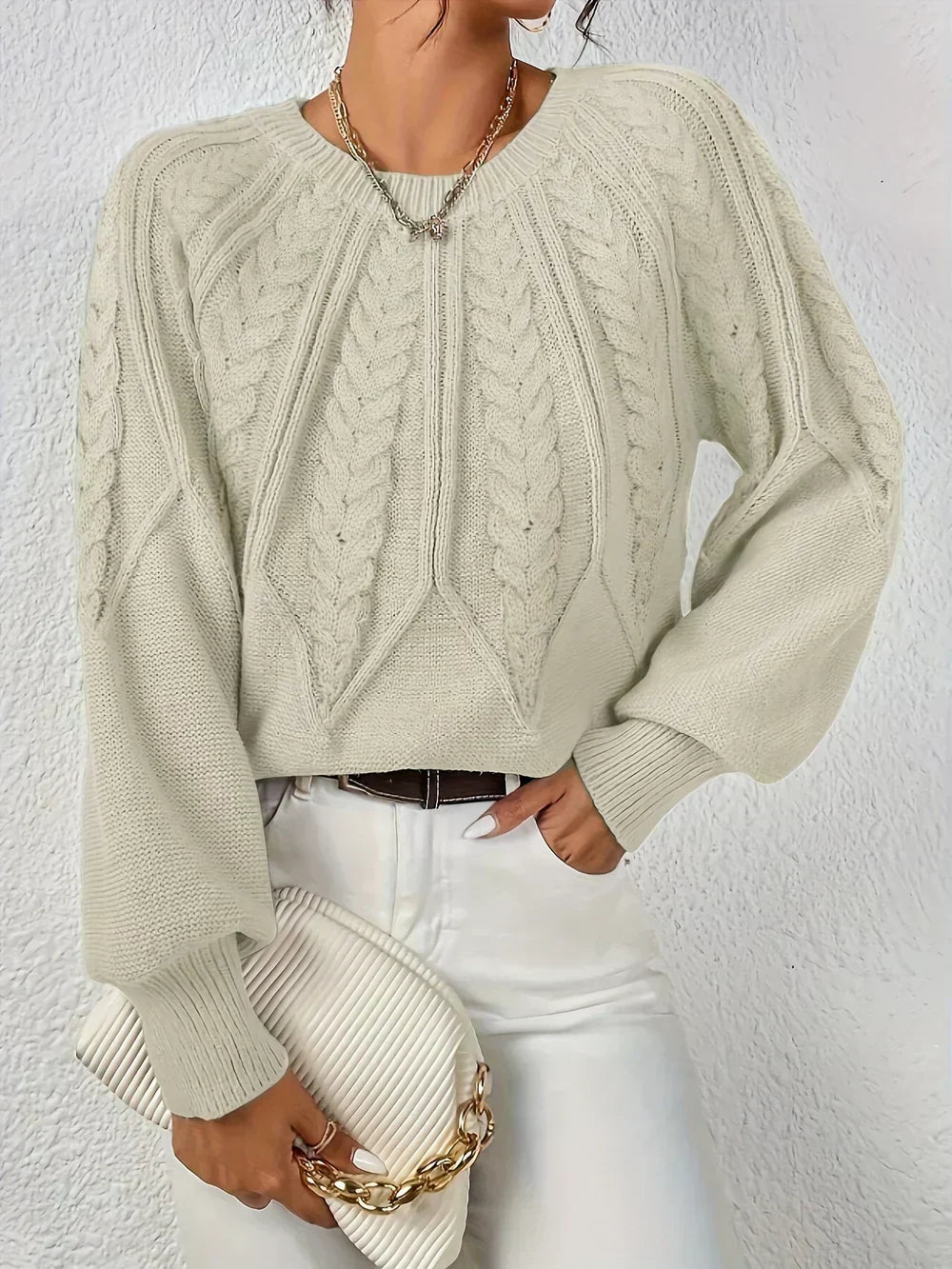 Pull femme en maille torsadée à manches raglan