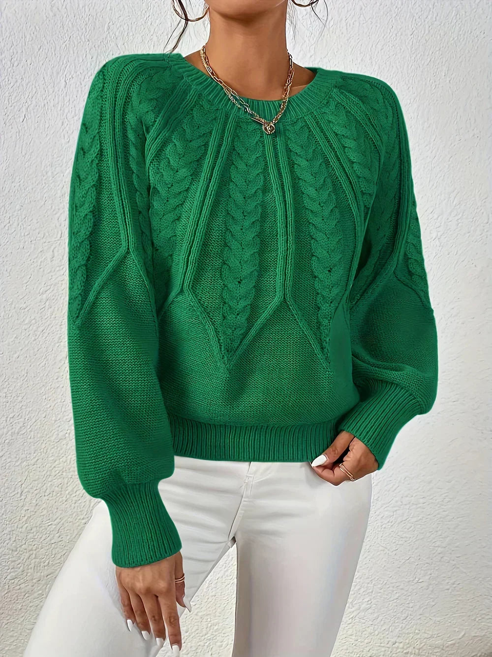Pull femme en maille torsadée à manches raglan
