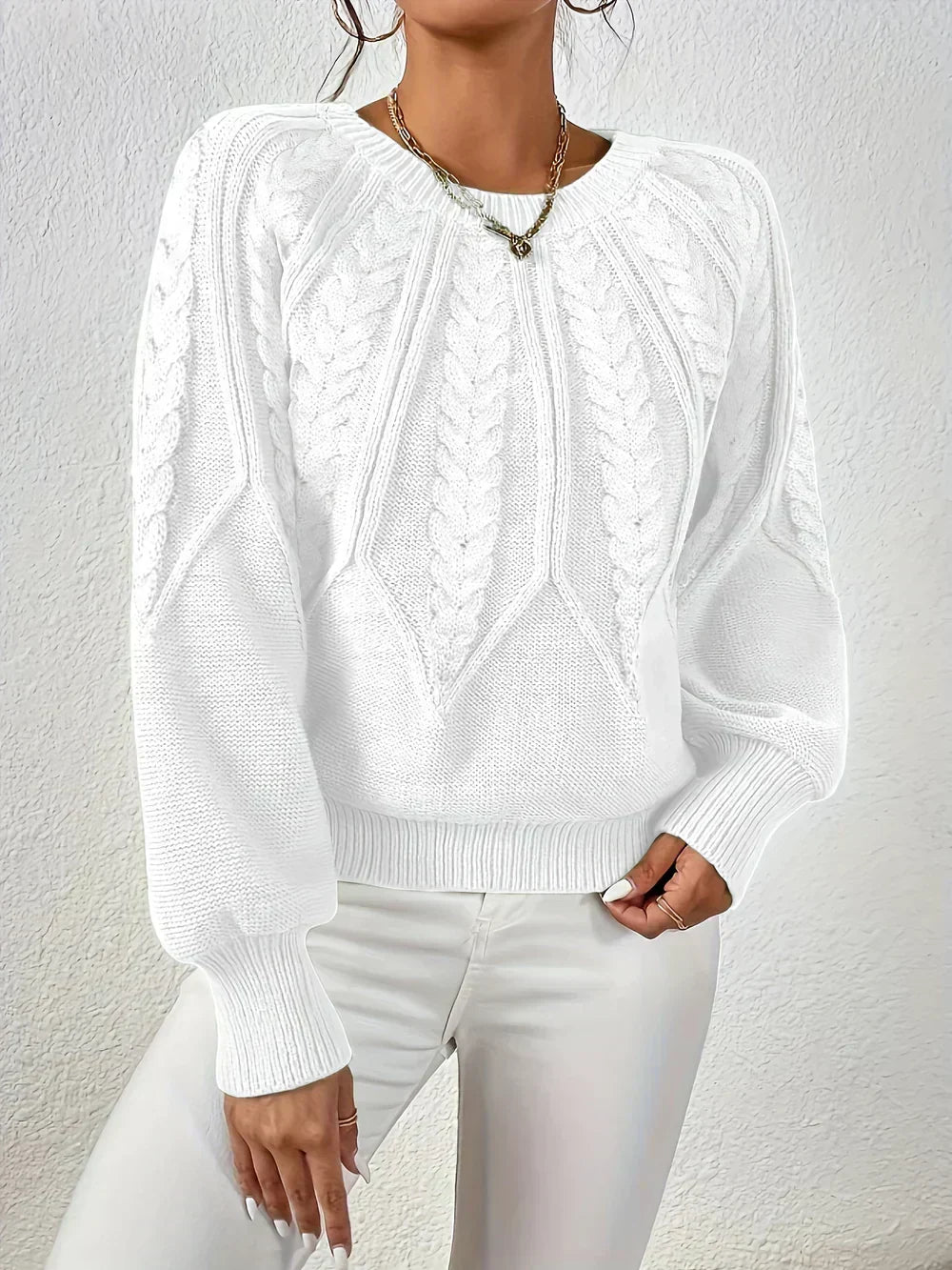 Pull femme en maille torsadée à manches raglan