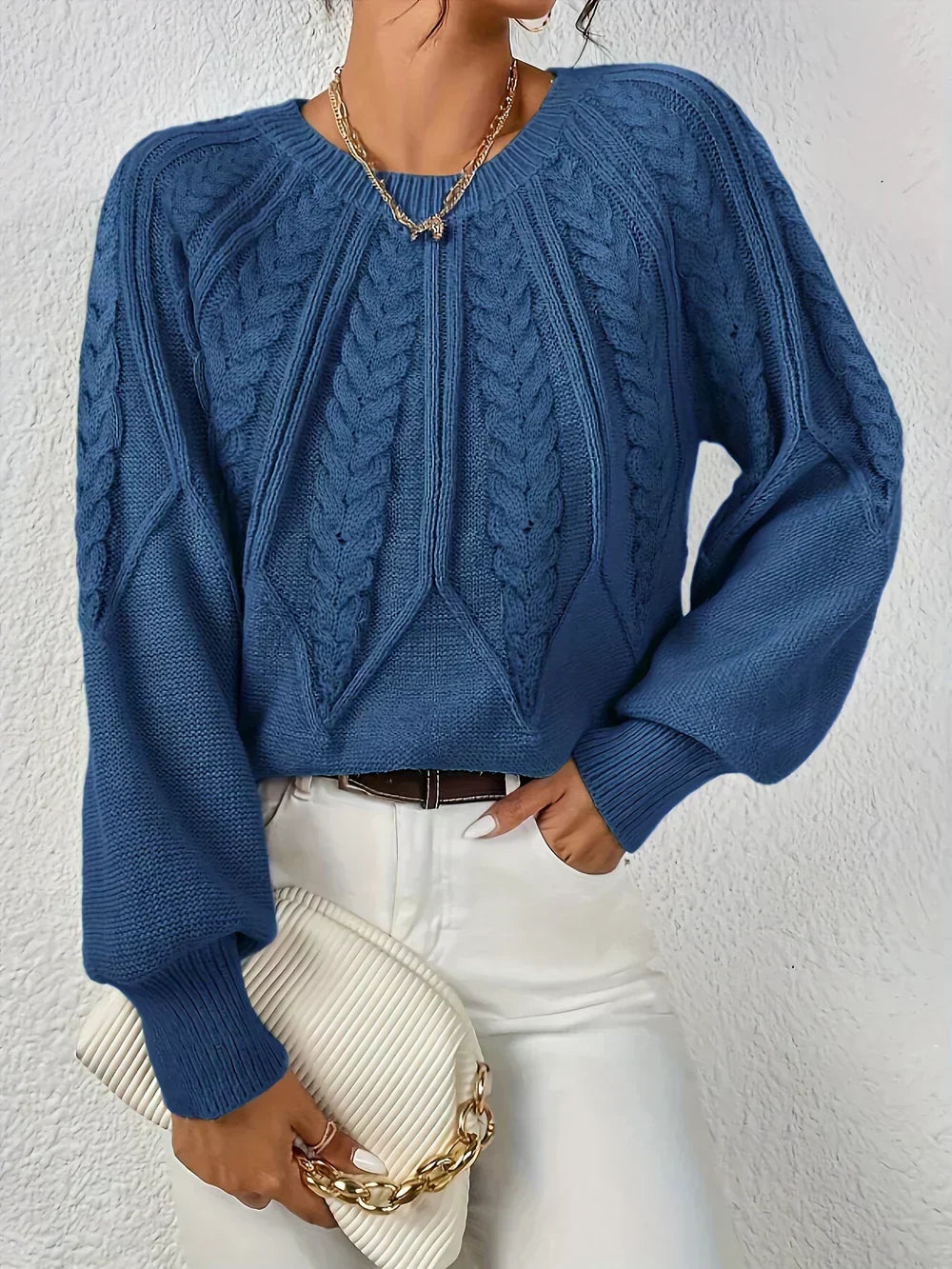 Pull femme en maille torsadée à manches raglan