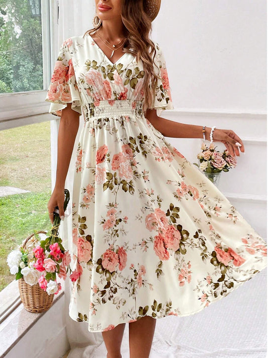 Robe midi cintrée et évasée à col en V pour femme