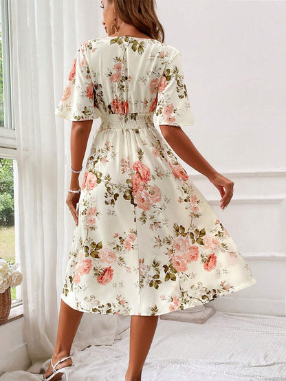 Robe midi cintrée et évasée à col en V pour femme