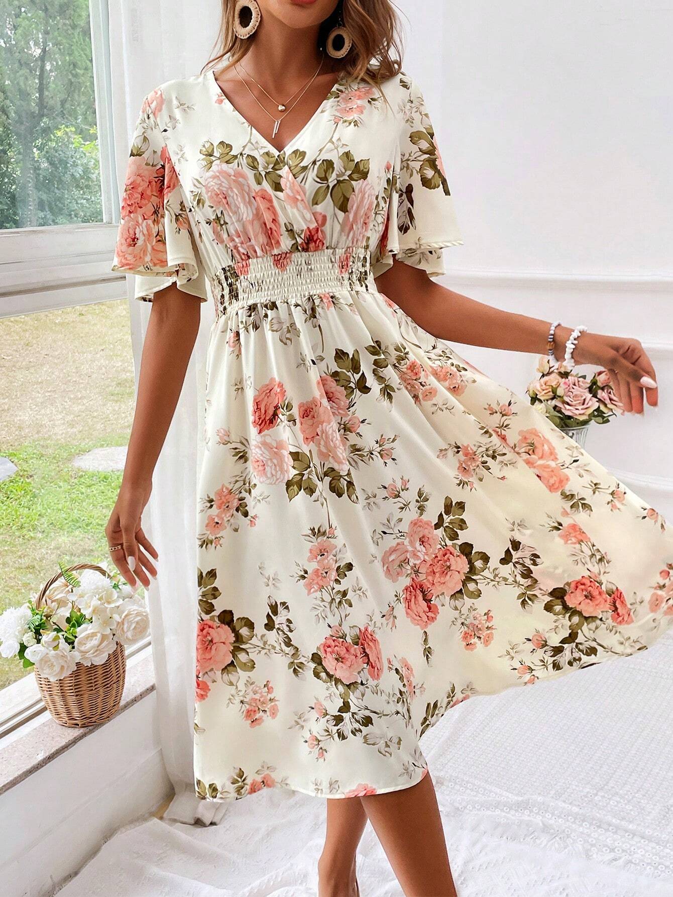 Robe midi cintrée et évasée à col en V pour femme