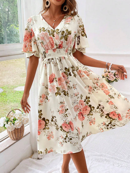 Robe midi cintrée et évasée à col en V pour femme