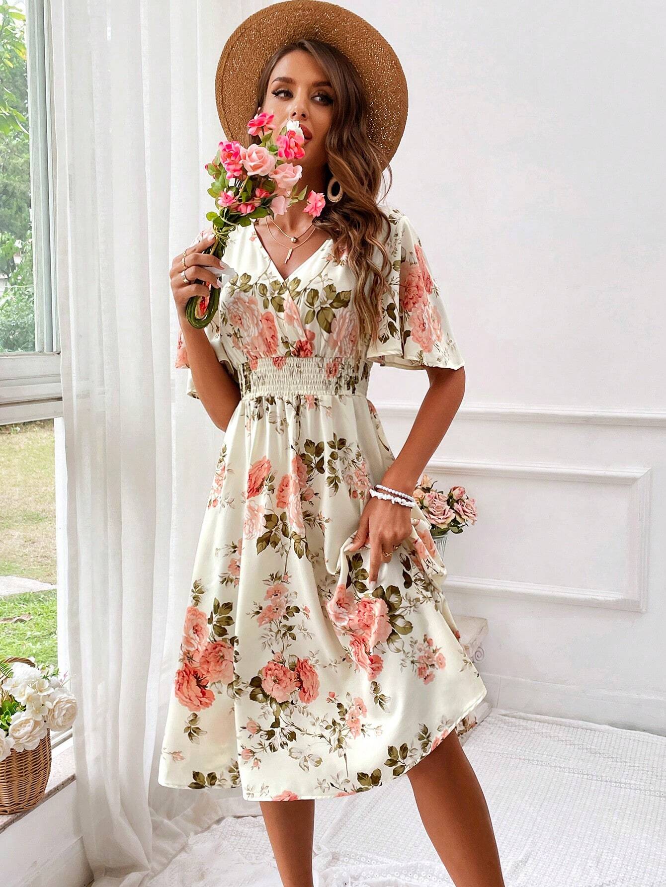 Robe midi cintrée et évasée à col en V pour femme