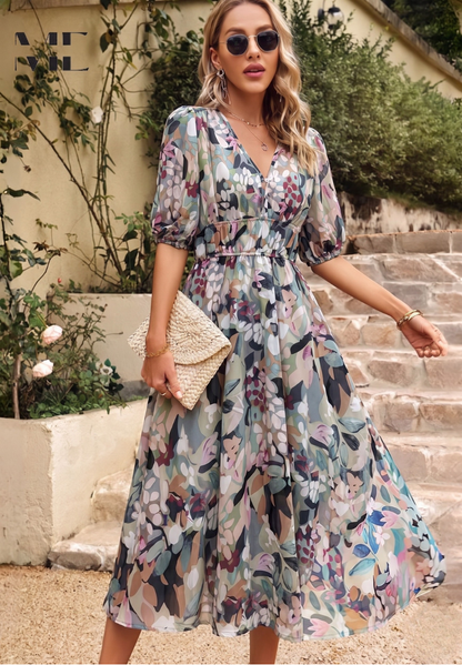 Robe midi élégante à fleurs à manches bouffantes