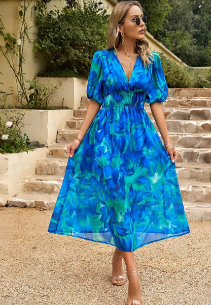Robe midi élégante à fleurs à manches bouffantes