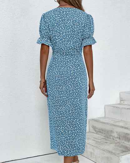 Robe portefeuille élégante à imprimé fleuri et col en V