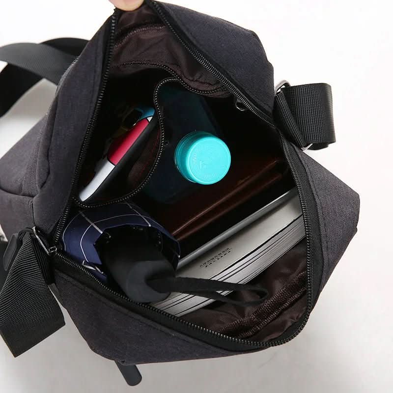 Sac bandoulière homme imperméable avec dispositif anti-vol