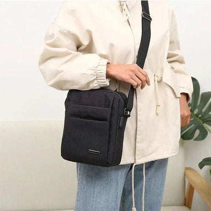 Sac bandoulière homme imperméable avec dispositif anti-vol