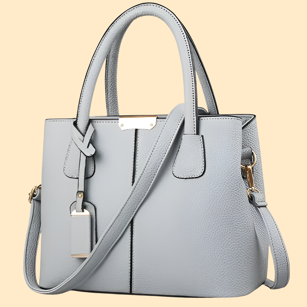 Sac porté main structuré pour femme avec détail pompon