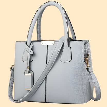 Sac porté main structuré pour femme avec détail pompon