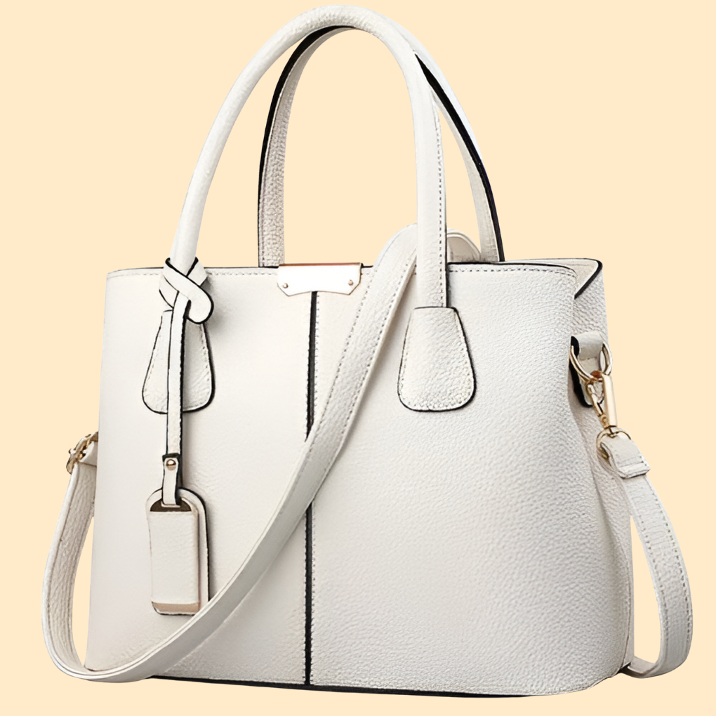 Sac porté main structuré pour femme avec détail pompon