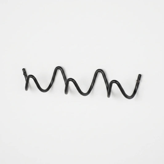 Support mural en forme de vague
