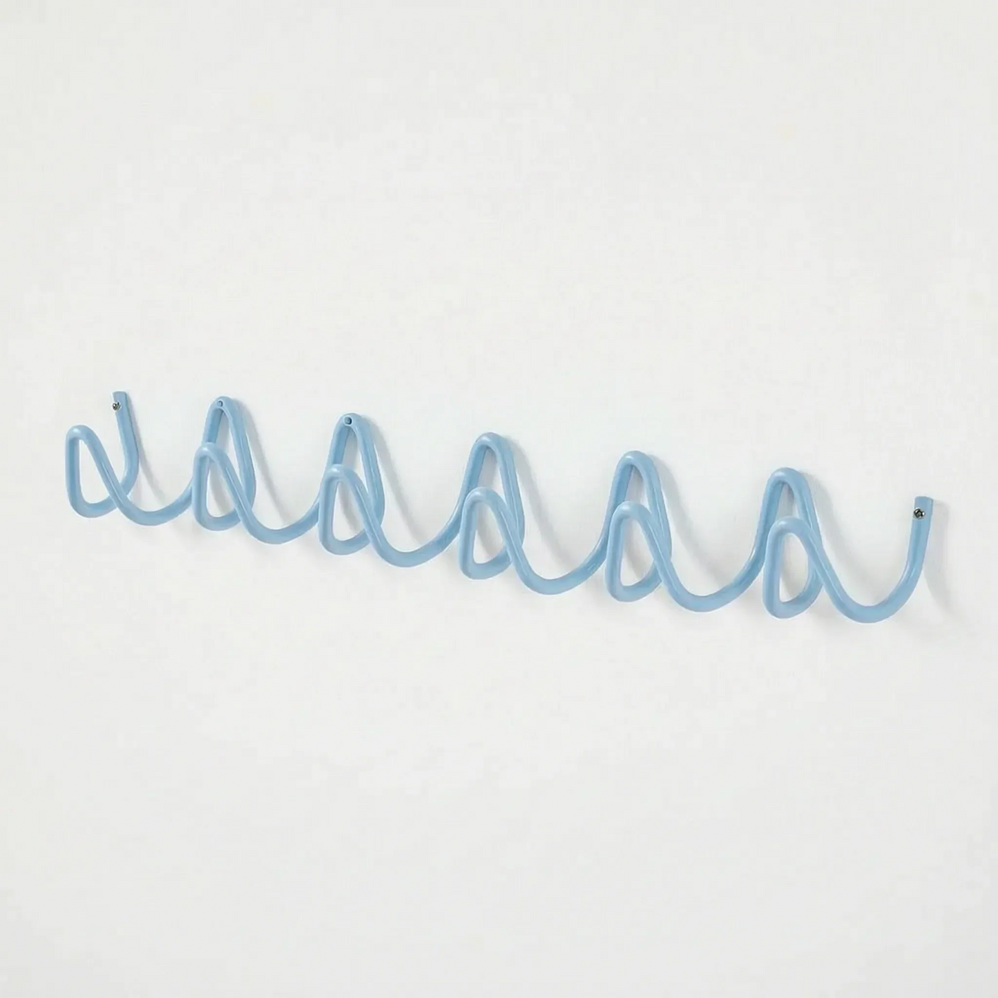 Support mural en forme de vague