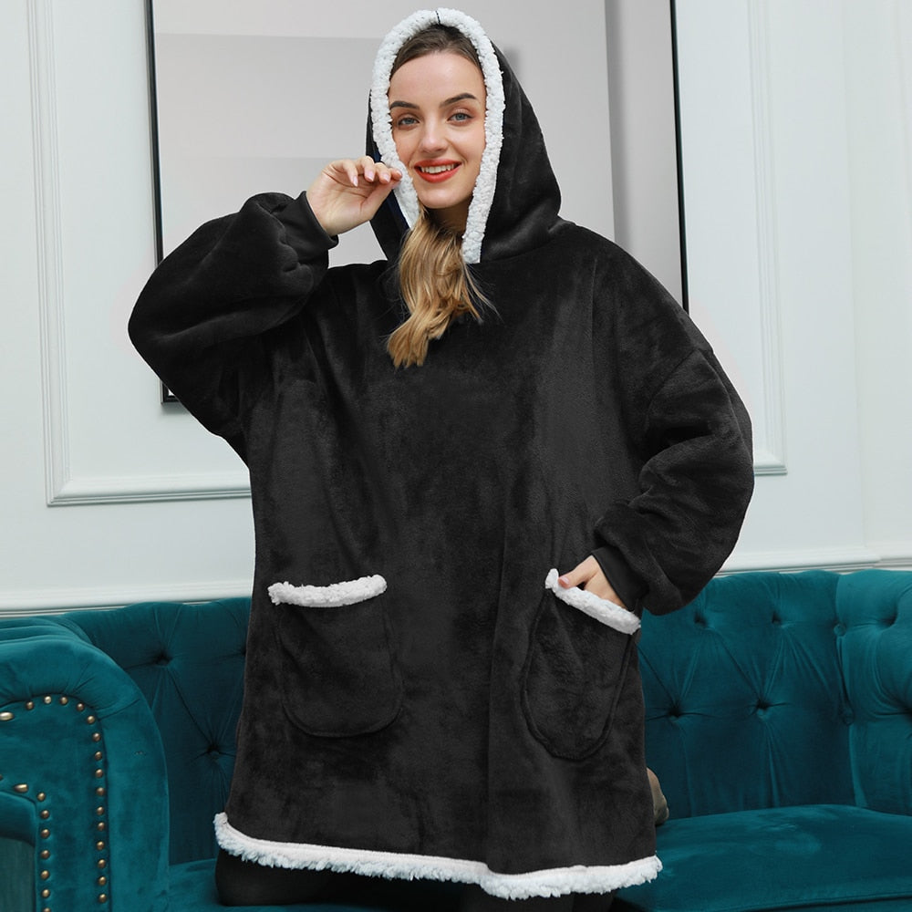 Sweat à capuche et couverture | agréable combinaison d’un sweat à capuche doux et d’une couverture confortable réunis en un seul!
