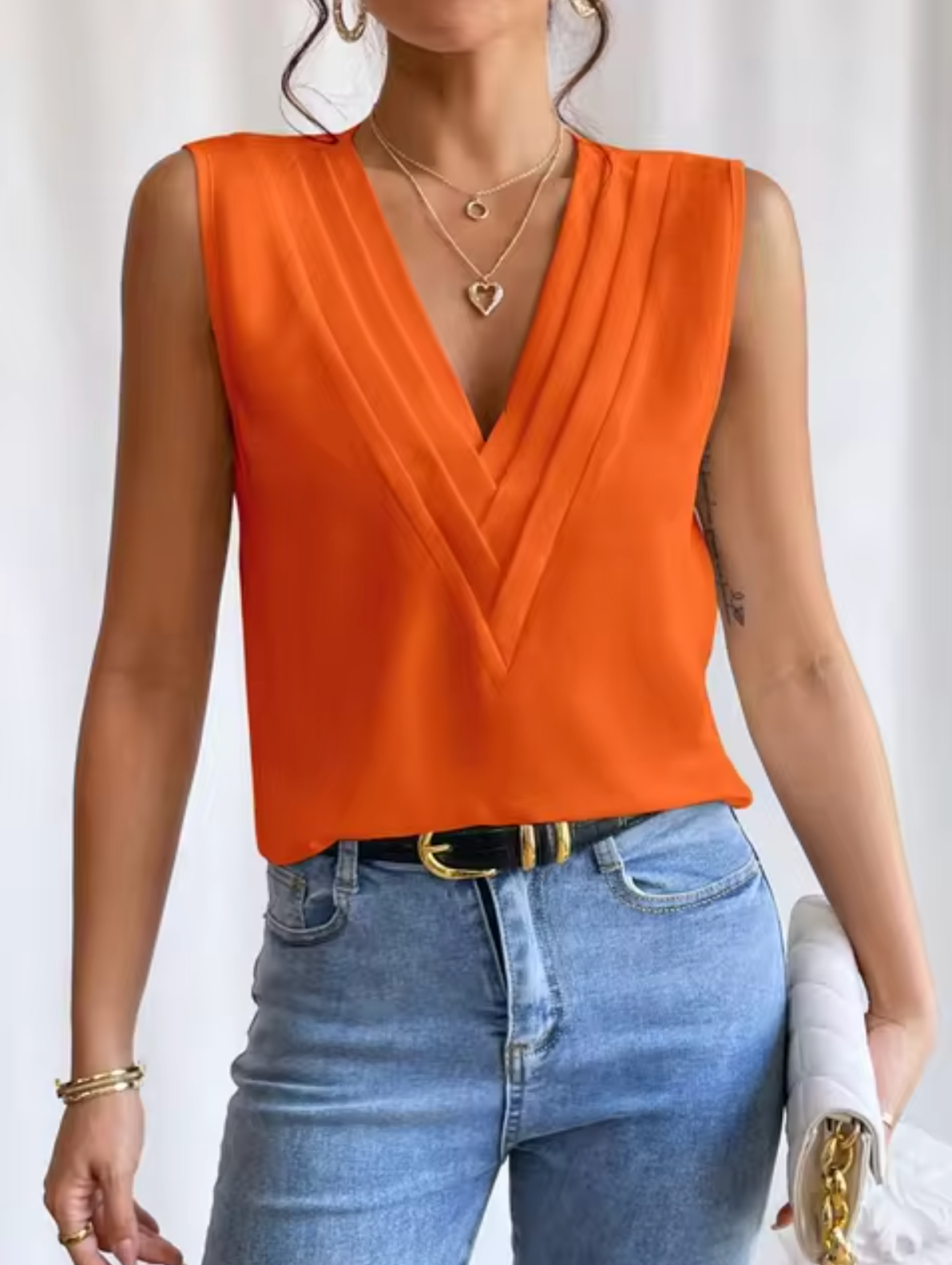 Top femme élégant sans manches à col en V plissé