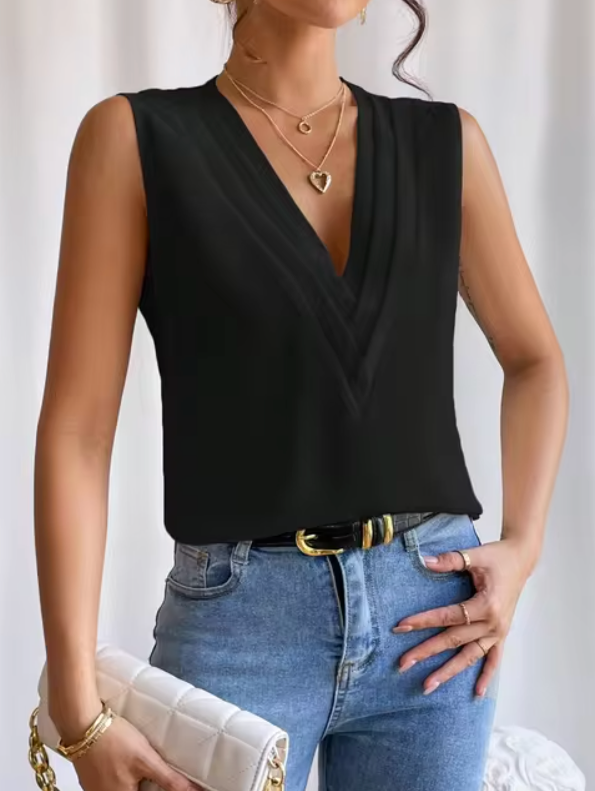 Top femme élégant sans manches à col en V plissé